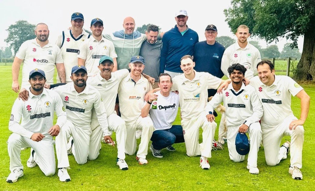 Audlem Cricket Club team celebrating on the outfield at The Gorse Croft
