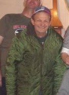 Donald Sutton in a quilted jacket and cap